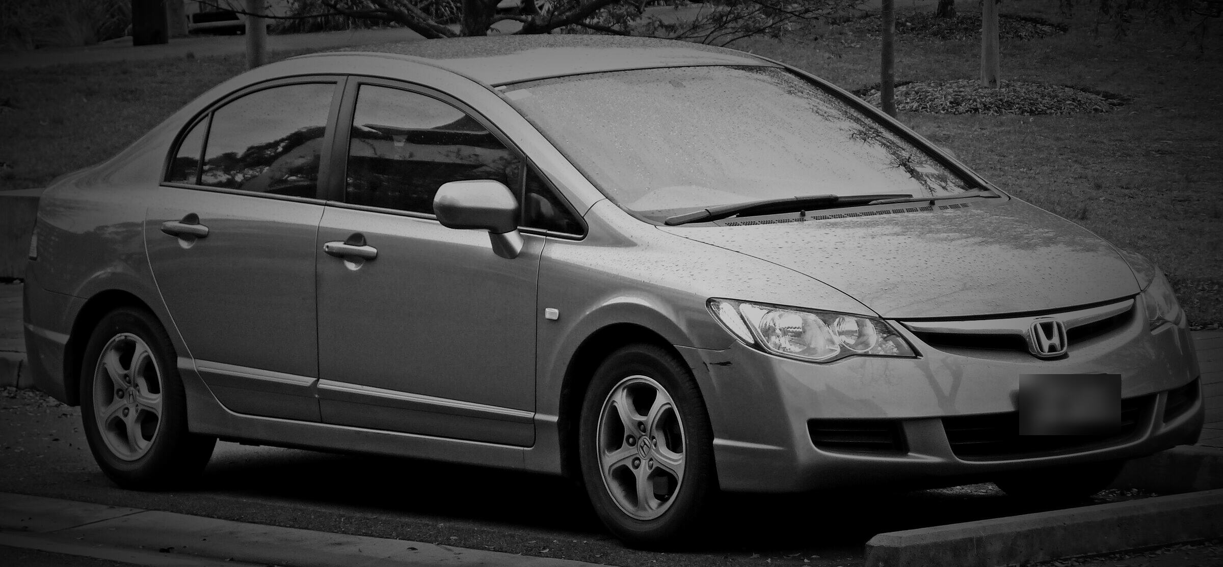 A silver 2006–2009 Honda Civic sedan